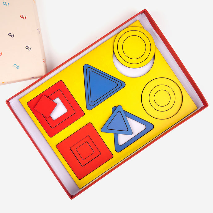 Colorful Shapes Puzzle, concentric circles and squares and triangles in mom squad box