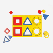 Load image into Gallery viewer, Colorful Shapes Puzzle, concentric circles and squares and triangles on display
