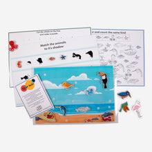 Load image into Gallery viewer, activity sheets, beach chart, animal cut out stickers and instruction manual

